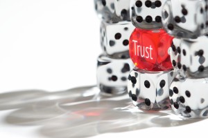 Red Dice Standing out from the crowd, Trust concept.